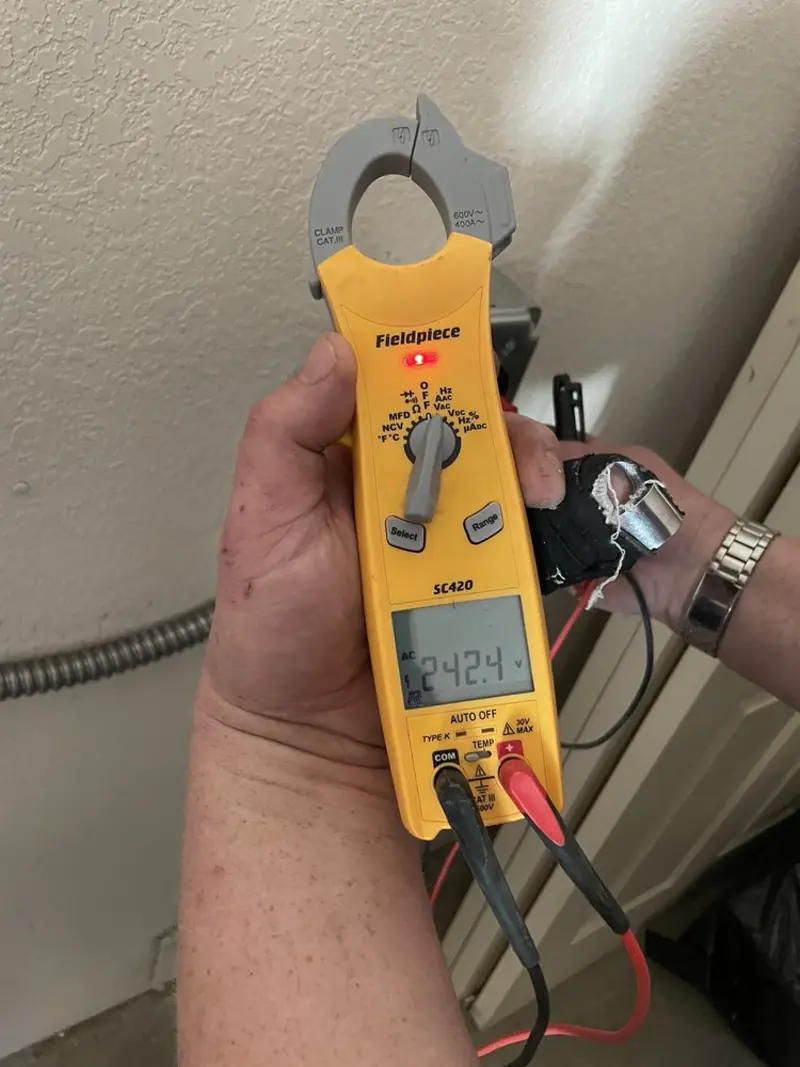 Voltage testing with clamp meter during Generator Installation in Hughson